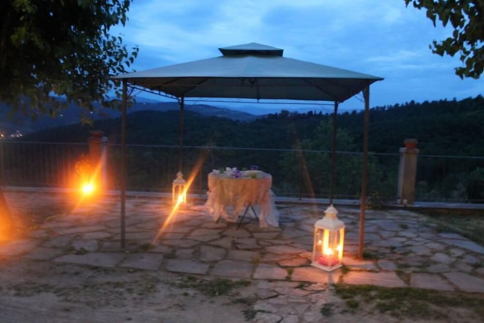sunset with candle on terrace