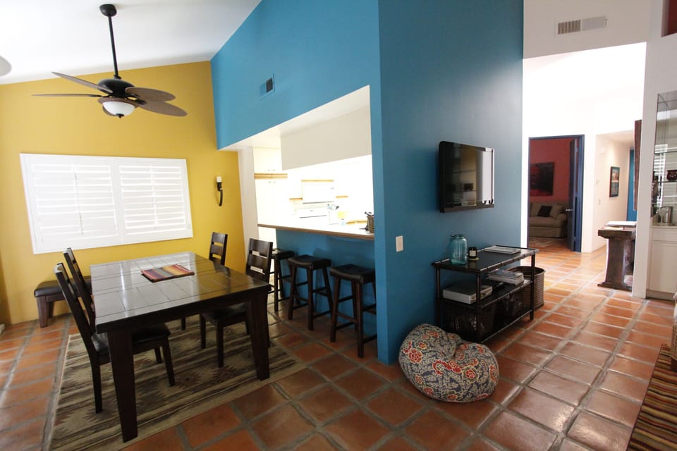 dining room, kitchen and hallway to den