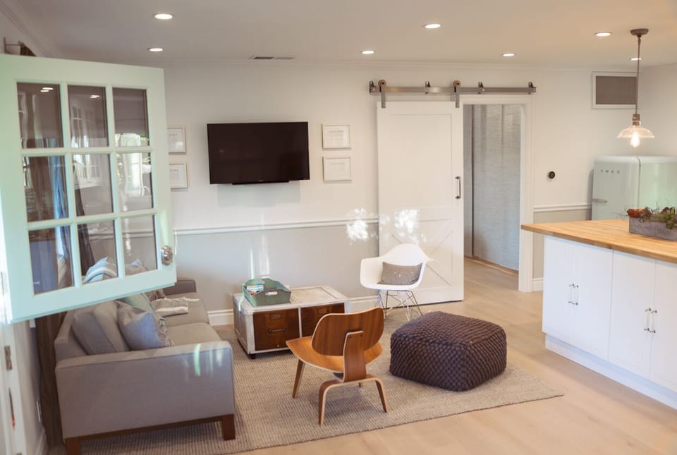 The Front Room with Sony HDTV's and a view into the Barnroom