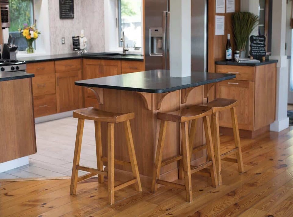 Kitchen- Bar stools at the kitchen island for casual dining and conversation.