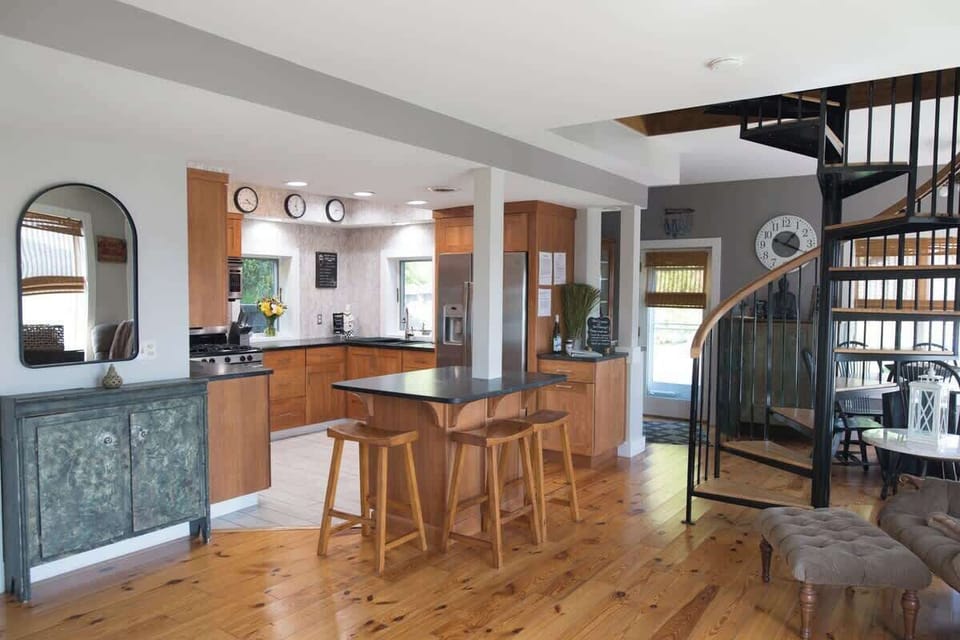 Enjoy the open-concept flow from the living room to the kitchen and dining areas—perfect for gathering together.