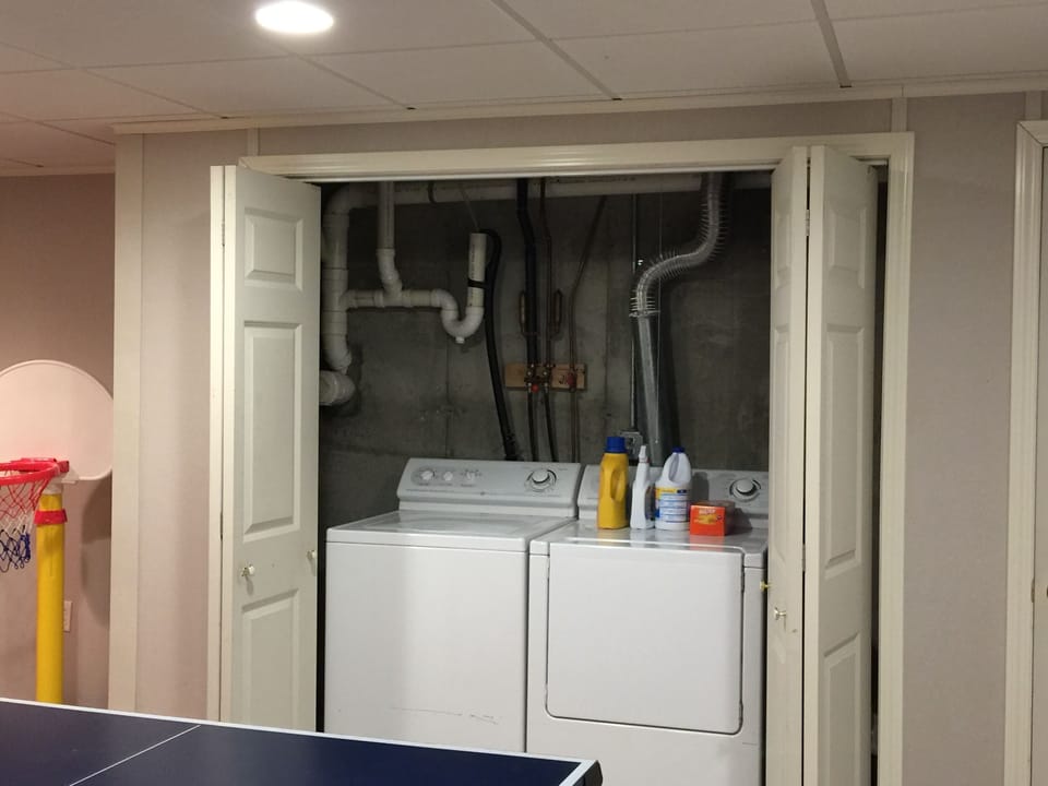 Washer & dryer in basement.