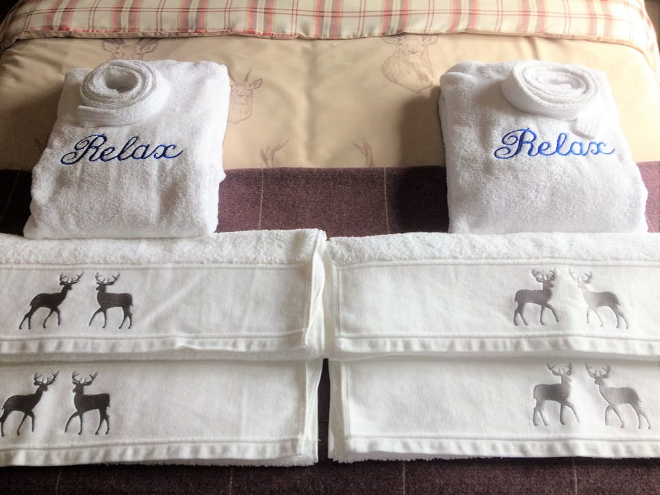 Luxury towels and bath robes.