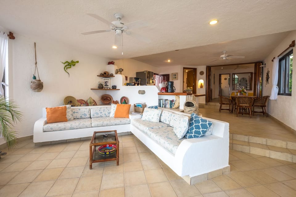 Living Area - with a view of Half Moon Bay beach Luna Azul condo 1 Akumal Mexico 2 BR condo vacation rental