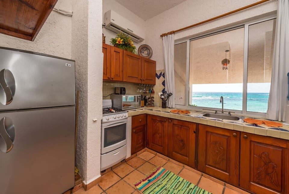 Kitchen - La Sirena condo 14 Akumal Mexico vacation rental 2 king bedrooms with 2 baths.