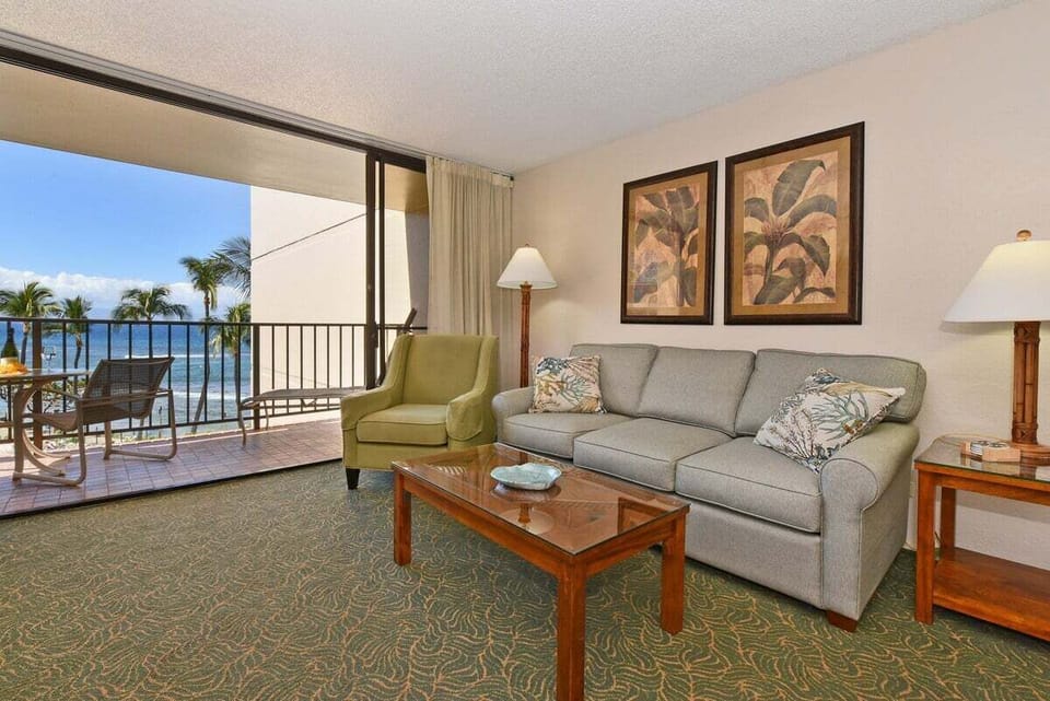 Relax in the inviting living room, complete with a comfortable sleeper sofa and a view of the Pacific