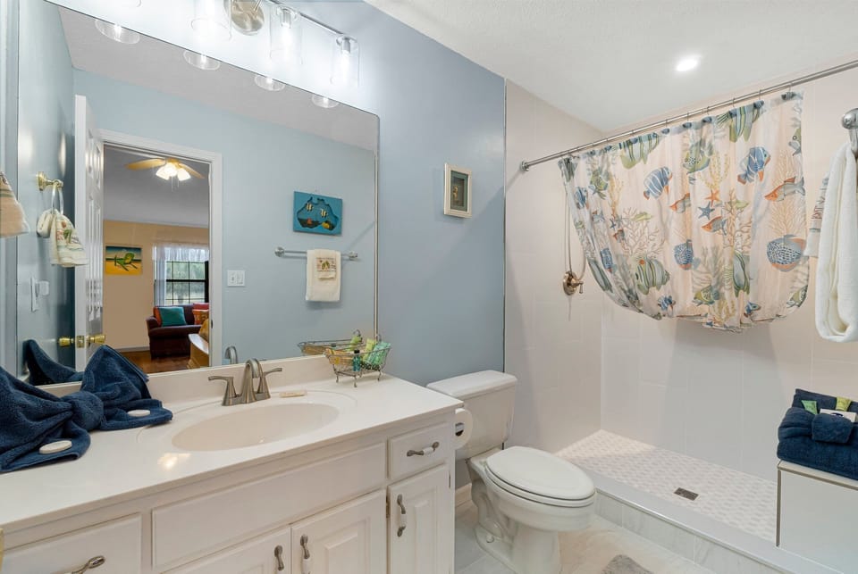 Adjoining bathroom.  Newly renovated with walk in shower