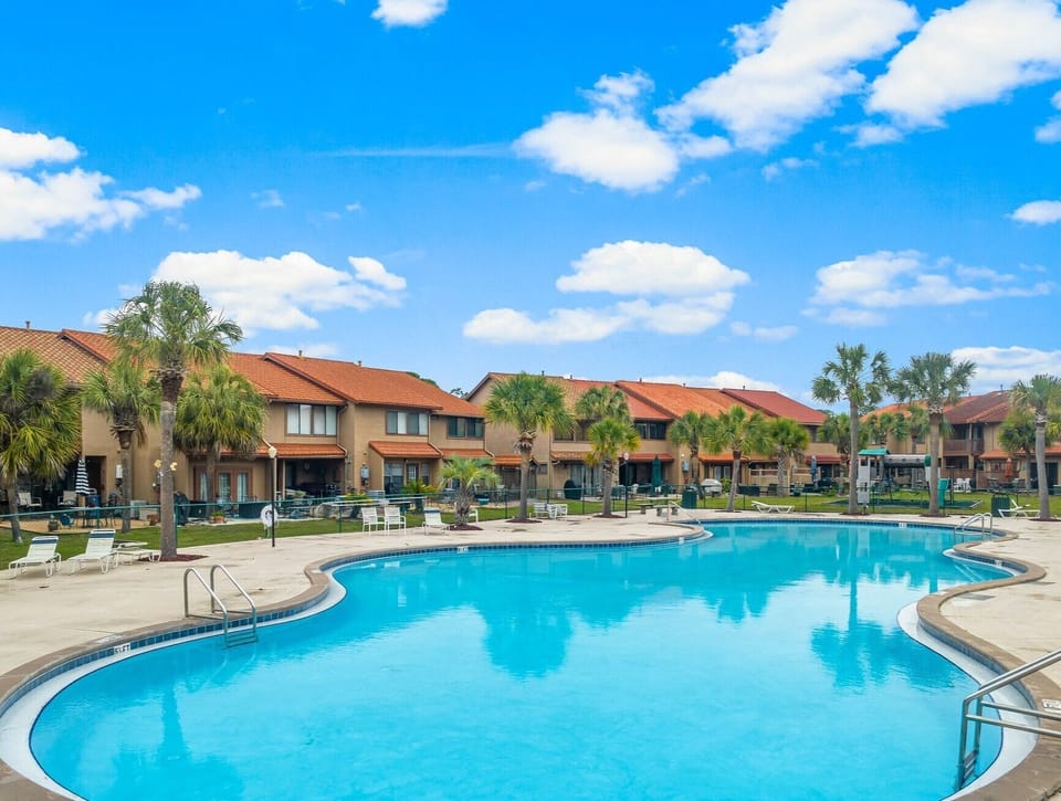 Island Pool, just seconds from the front door.  Lounge chairs, tables, bathroom