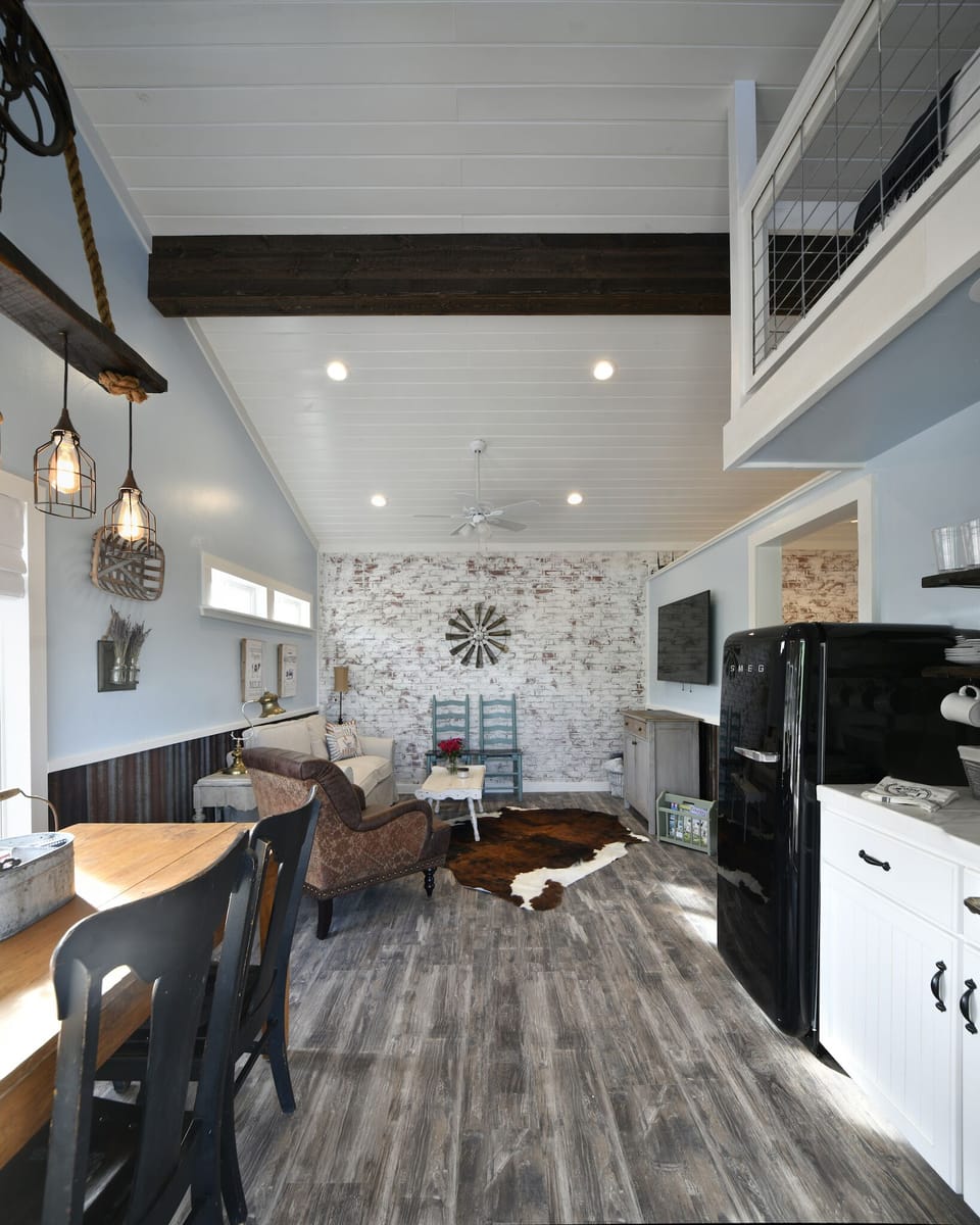 The kitchen and dining area are next to the living