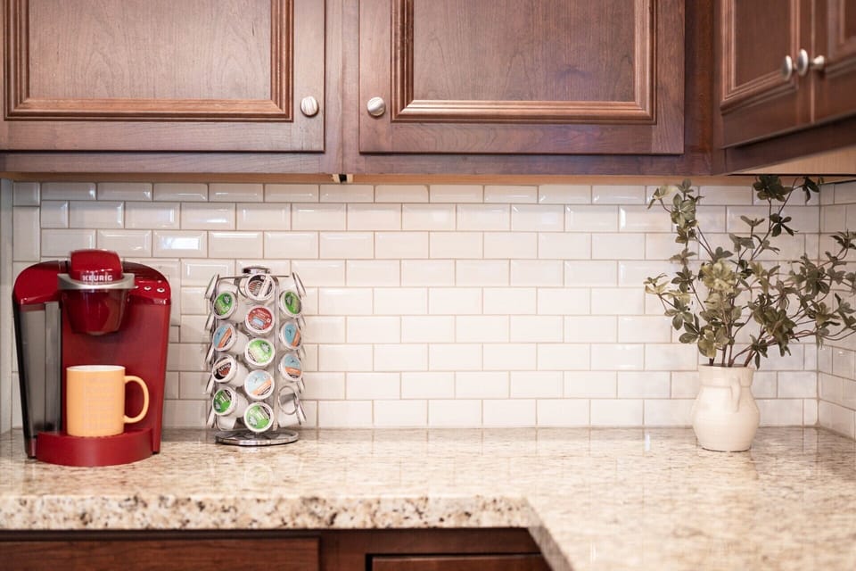 Both a Keurig and drip coffee maker, with pods and creamer provided. 