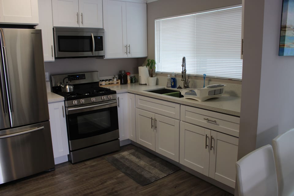 View into the rest of the kitchen from the living room.