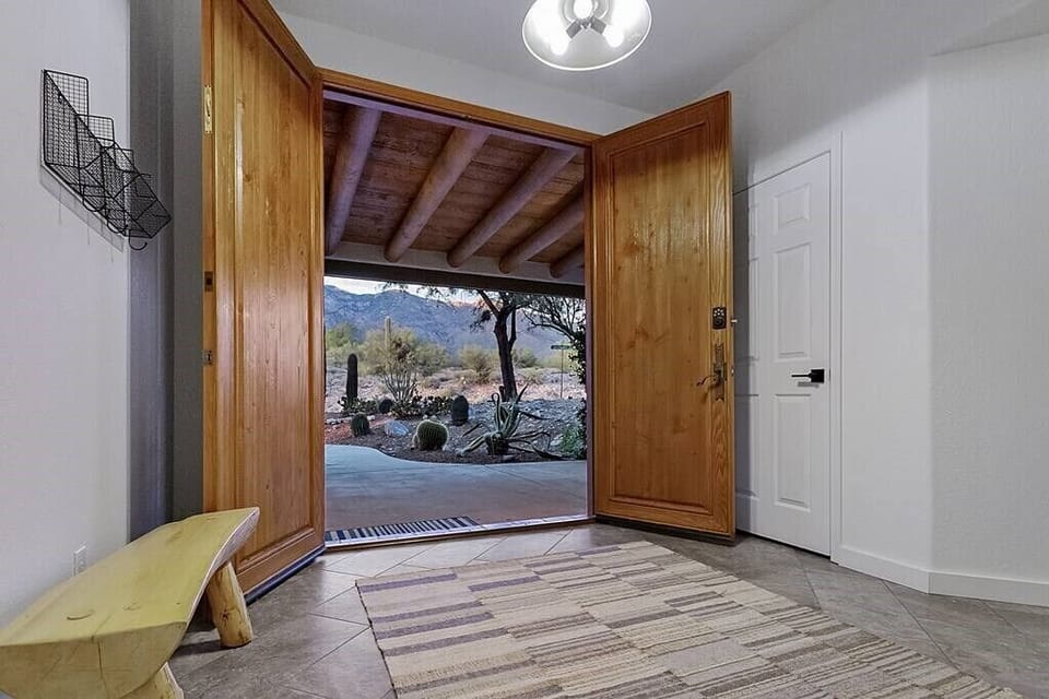 Covered front porch & entryway with easy key code lock.