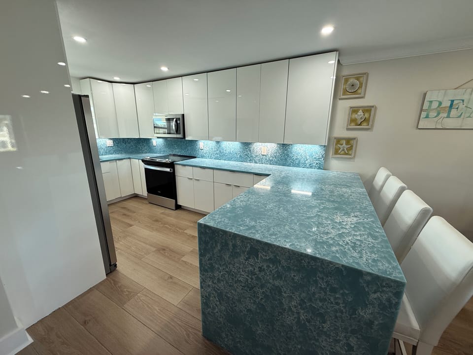 Beautiful, Large Kitchen with Quartz Counters and Sleek, Modern Cabinets