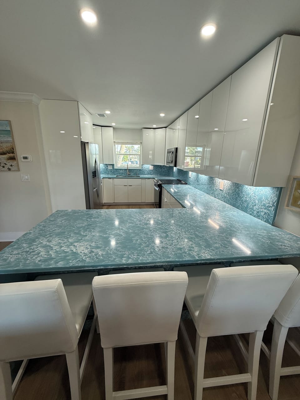 Beautiful, Large Kithcen with Quartz Counters and Sleek, Modern Cabinets