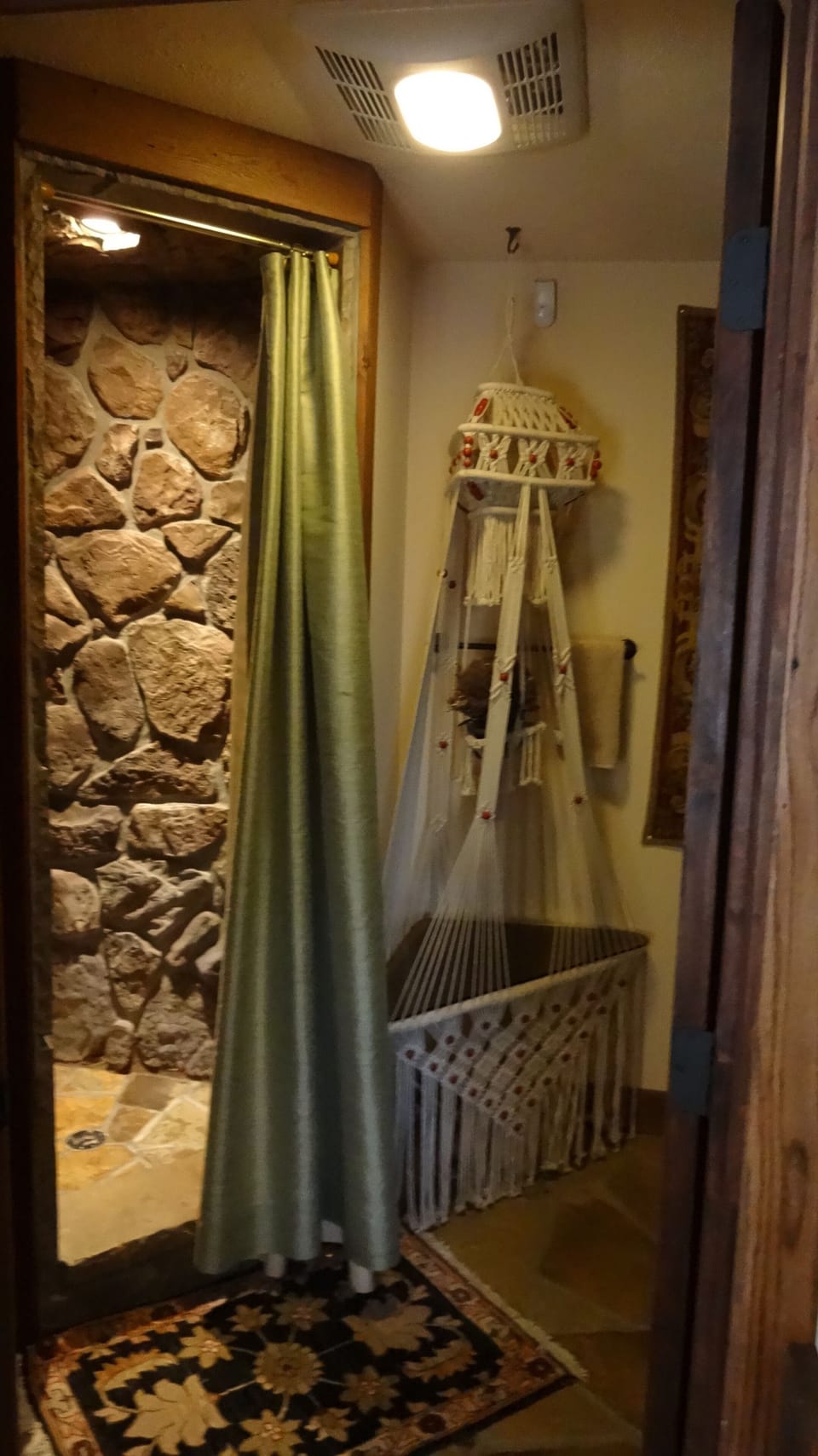 Loft bathroom (Hanging table is from the Philippines). 
