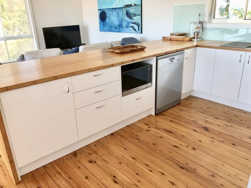 new kitchen, dishwasher and microwave, underbench oven, refrigerator