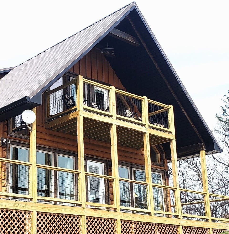 Bentwood rockers look out on a magnificent view of the Great Smoky Mountain Park