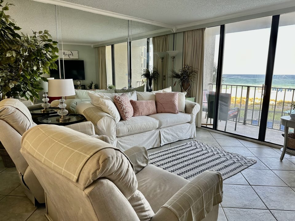 Enjoy the view in comfort. Pottery Barn sleeper sofa, two rocker recliners. 