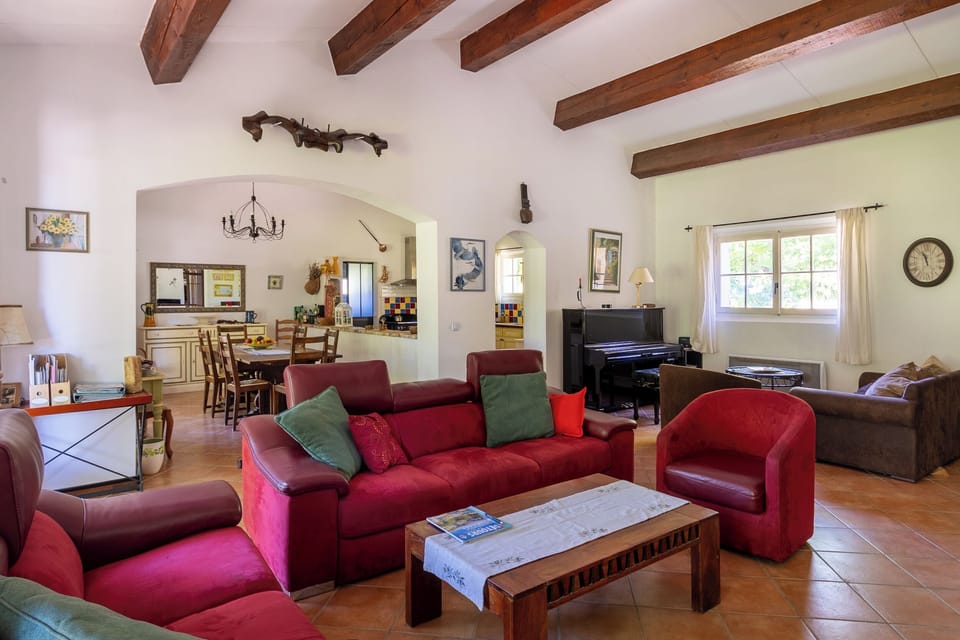 More views of the living room, beneath a beautiful cathedral ceiling