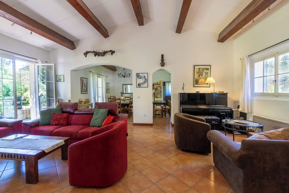 The sitting room with views to the dining room and kitchen