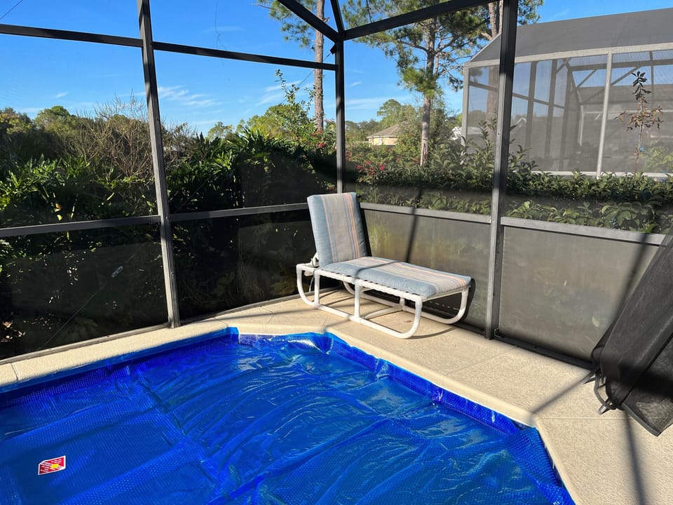 Pool cover in place to keep the heat in colder months