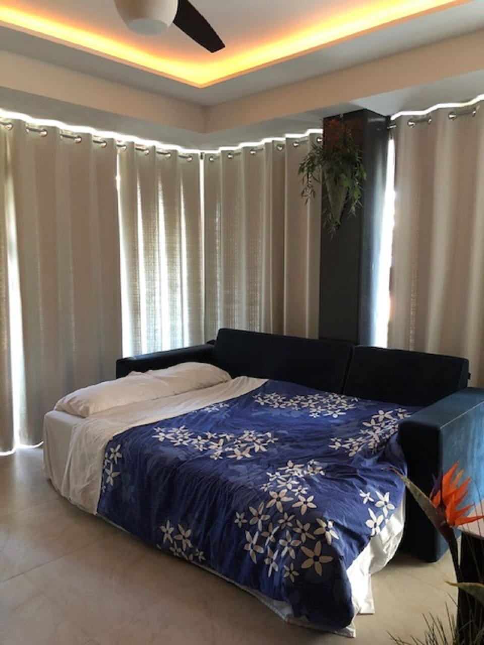 Fold out  couch bed in living room.