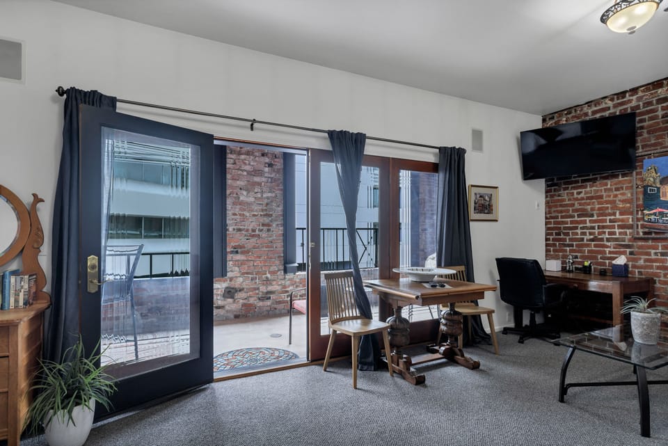 View from living area onto patio. Look at all that natural light!