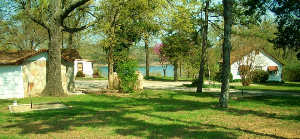 stone wall is back of cottage