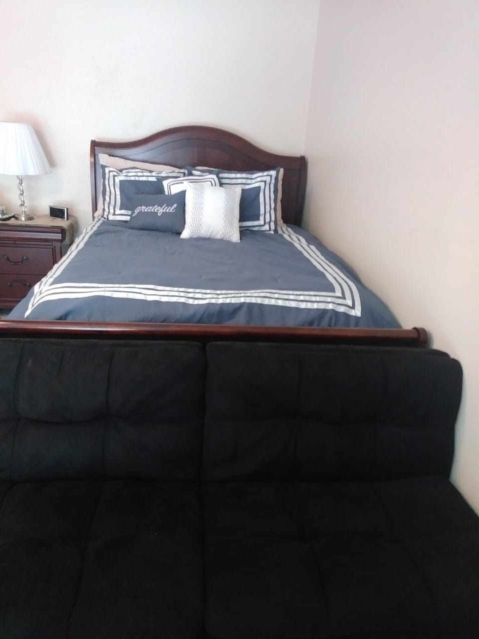 Queen size bed with memory foam mattress. Extra pillows/blankets in closet. 