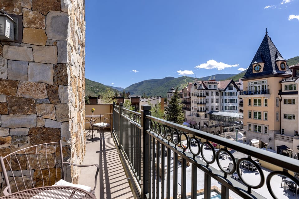 A private balcony offering sweeping mountain and village views. Step outside to enjoy fresh alpine air, charming architecture, and peaceful moments above it all.