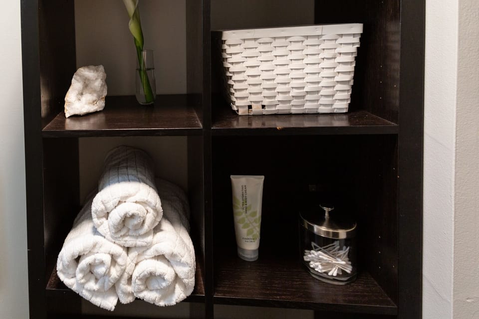 Plenty of fresh towels, a hair dryer & whatever else you may need in a bathroom.