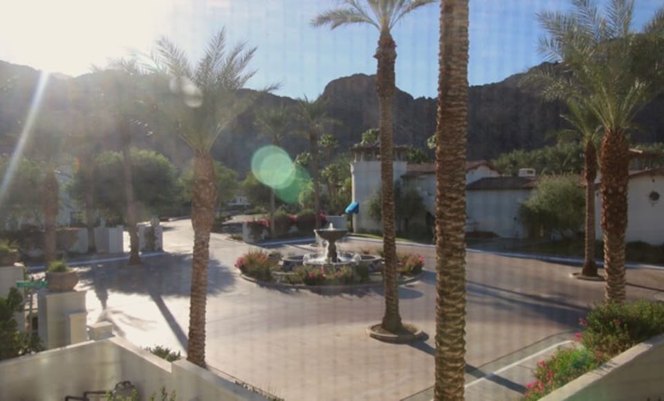King Suite 2 has view of surrounding mountains and front Welcoming Fountain.