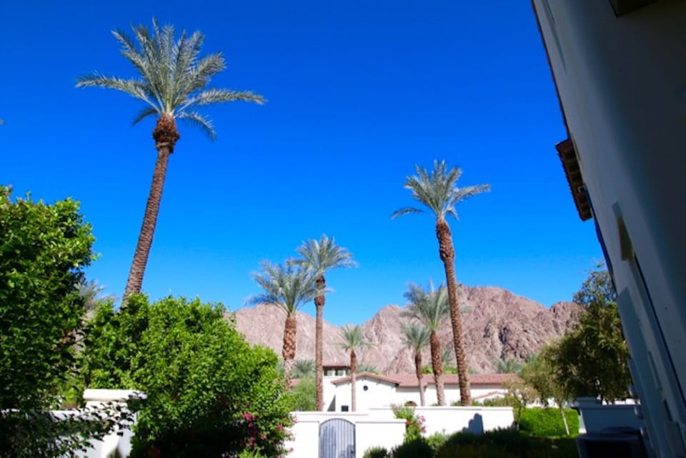 View from side of condo. Legacy Clubhouse and main Pool areas across the street.