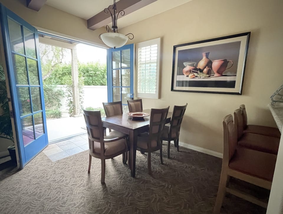 Dining Area. Seating for 5 + Barstools at the Breakfast Counter. 