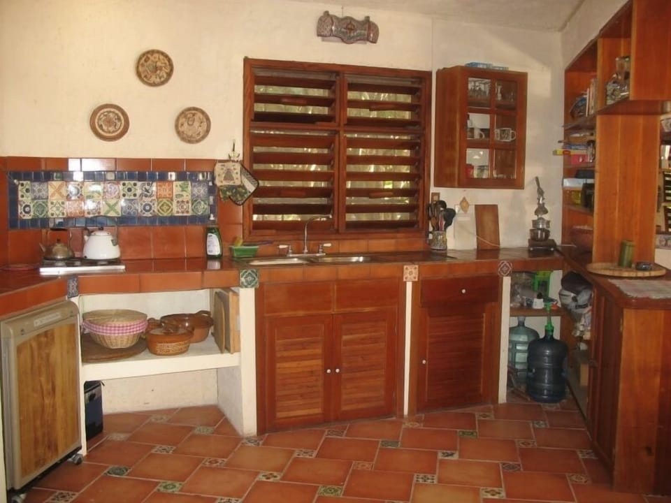 Downstairs kitchen area. Equipped with all necessary cooking utensils.