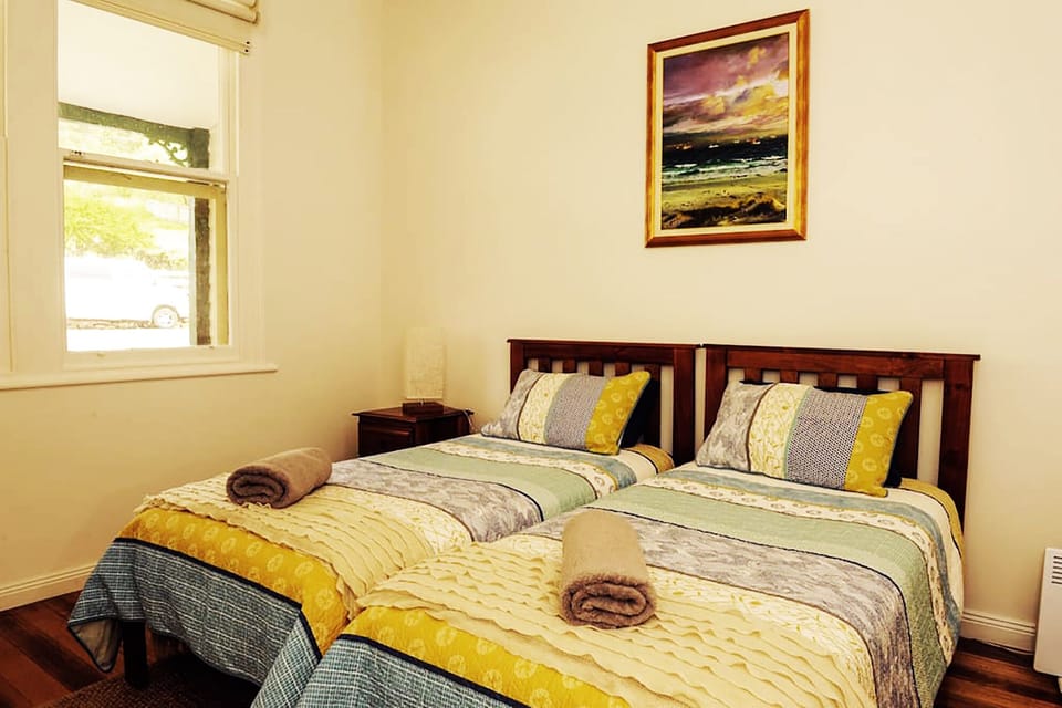 Spacious bedrooms with original Postmaster's features