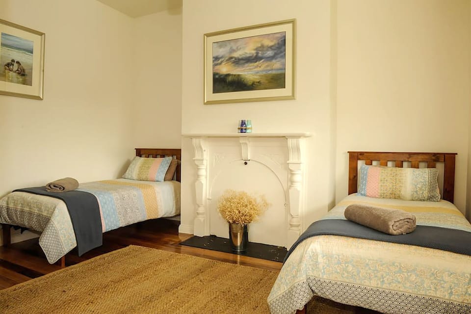 Original timber floors throughout and striking local artworks