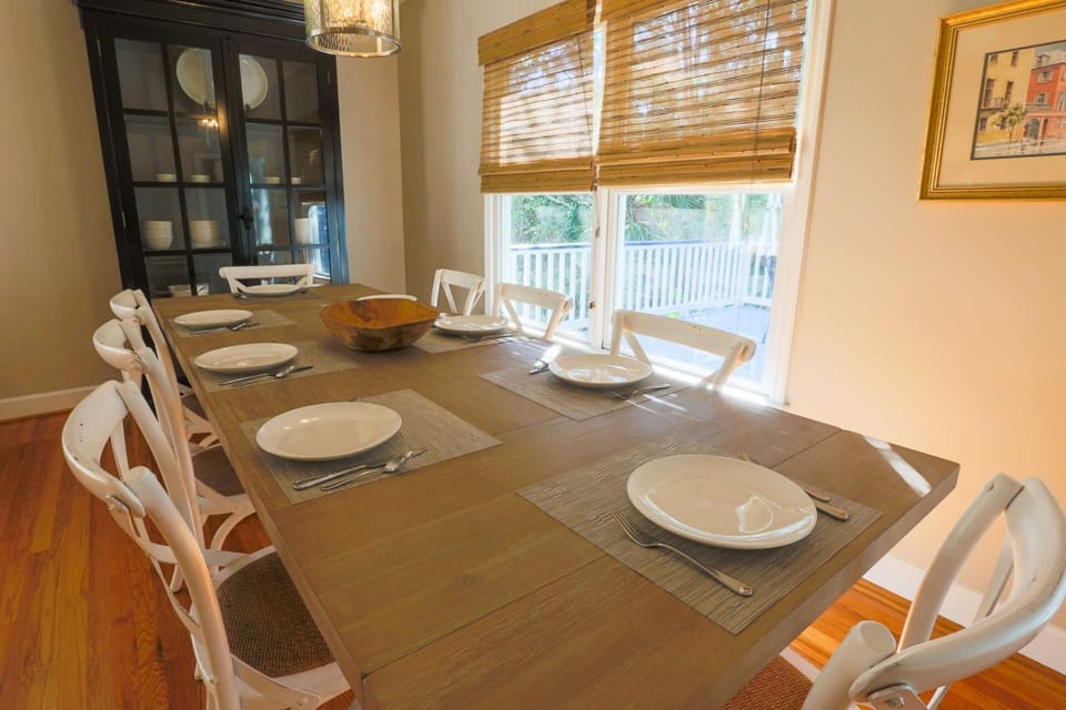 There's additional storage for plates, bowls & platters in the dining room cabinet.