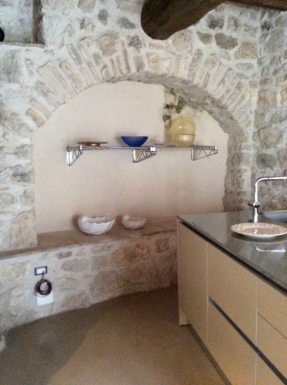 Kitchen is adapted to the original stone architecture