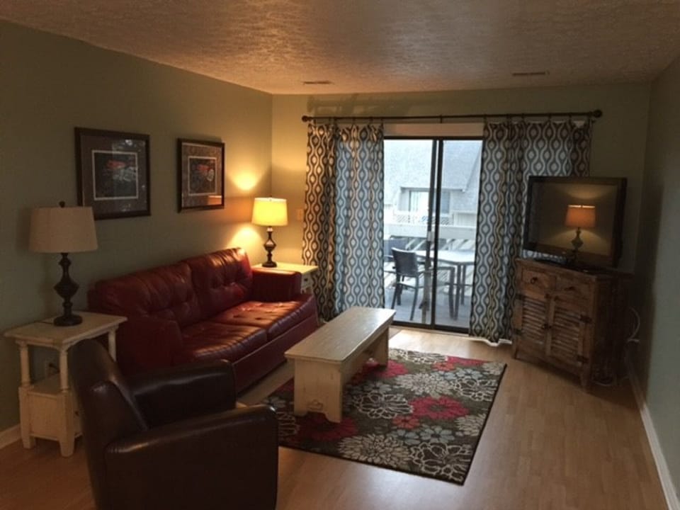 plenty of living room space with deck access
