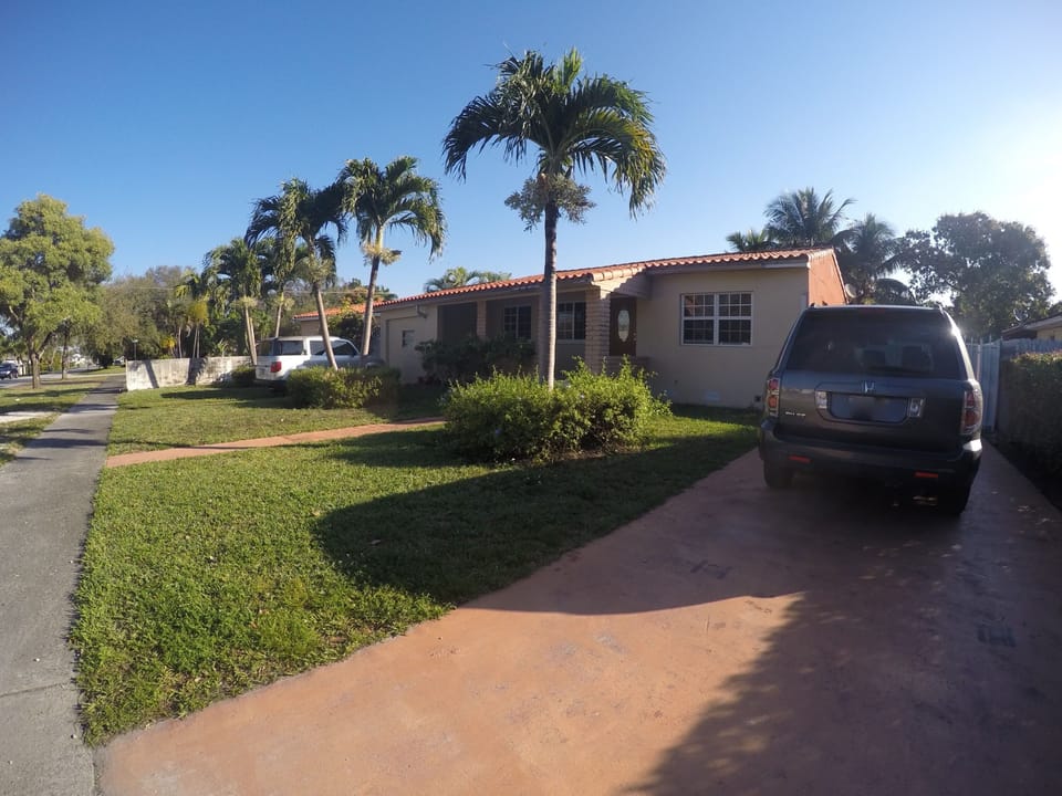 Front of the house. You can park two cars on the right side.
