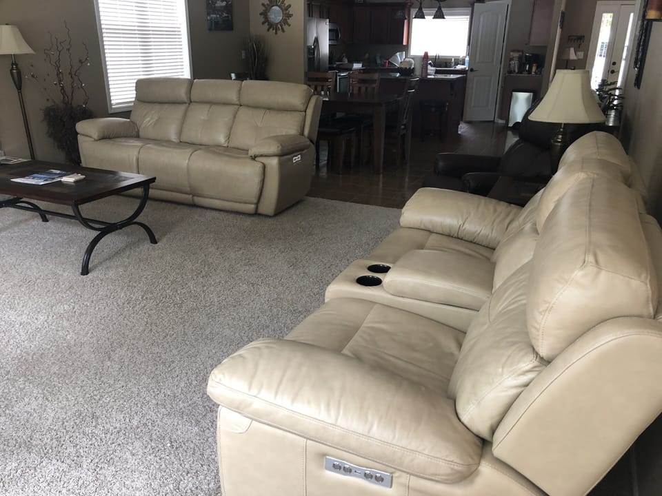 Reclining leather couches offer extra comfort and relaxation.