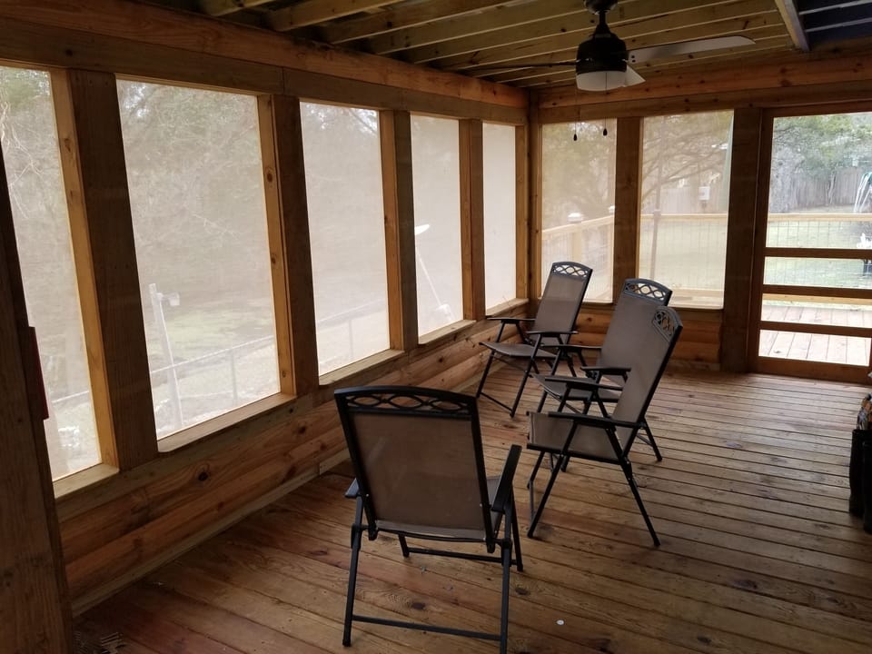 Screened in porch with ceiling fan