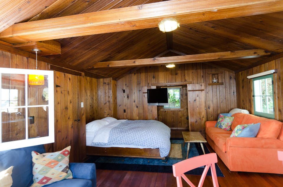 Comfy queen size Murphy bed.  TV swings into room so you can watch in bed.