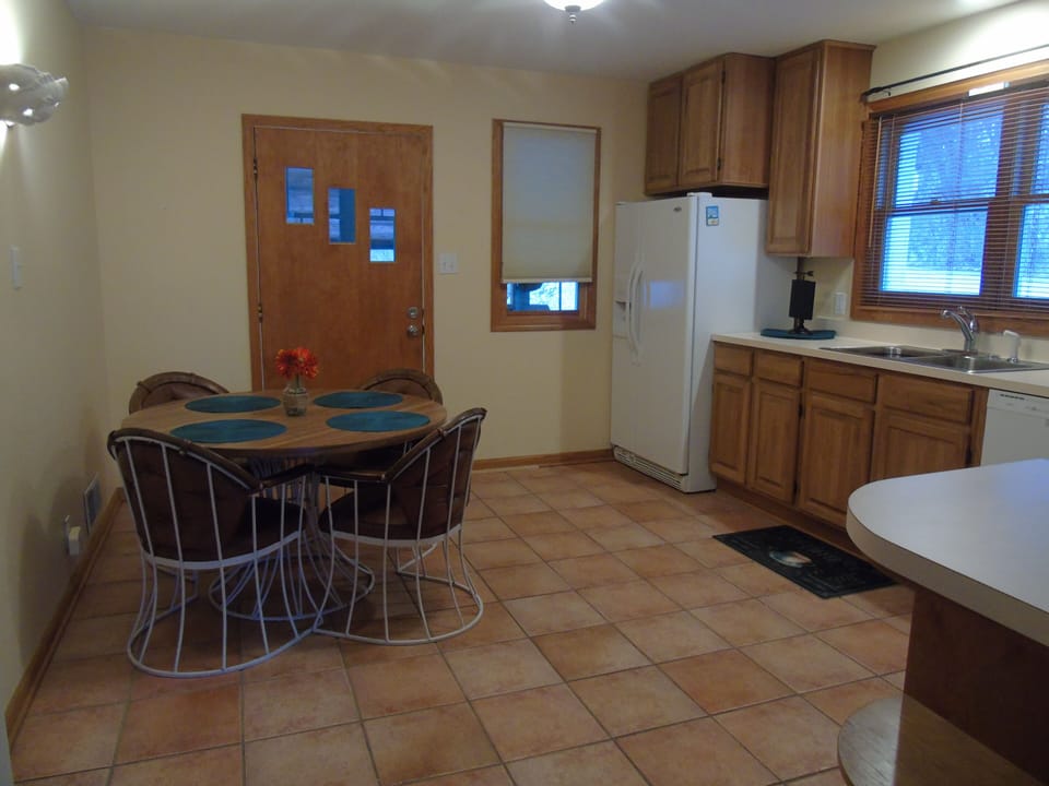 Eat in kitchen with fridge, stove, oven, microwave, dishwasher, garbage disposal