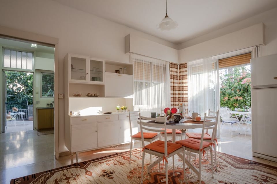 Family dining room adjacent to the kitchen and to the patio