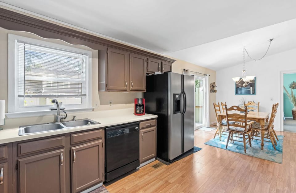 Microwave, coffee maker, refrigerator, oven and stove top 