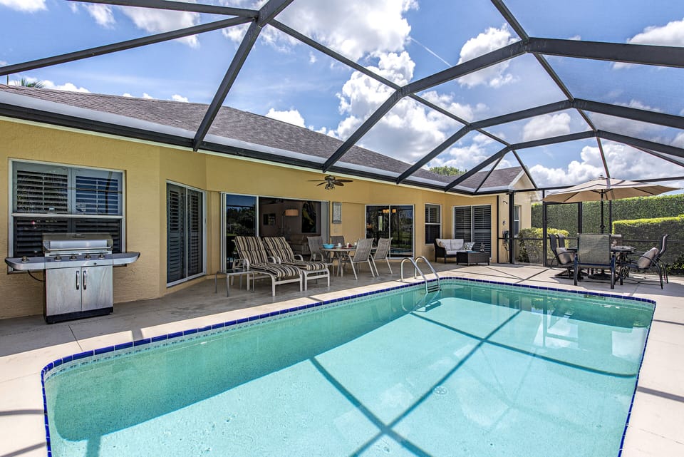 Sunny western exposure and plenty of room to lounge/dine by the SALT WATER pool