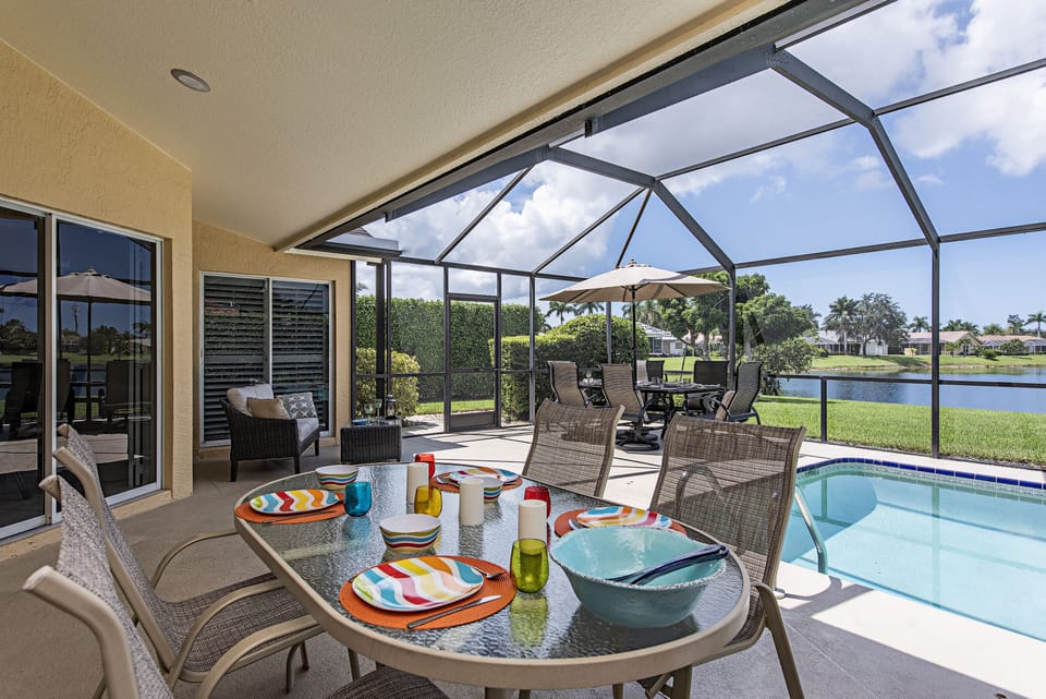 Stunning private lakefront view 2 lighted dining areas 6-8, one has fan, shade