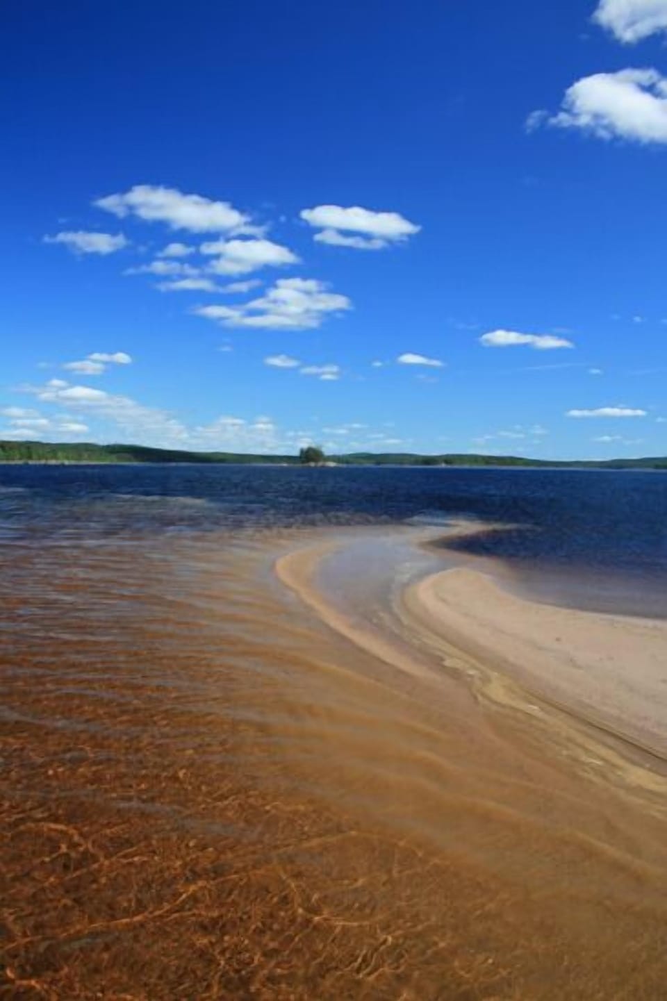 Unspoilt stretch of sand middle of lake! Perfect for escaping to by canoe/boat!